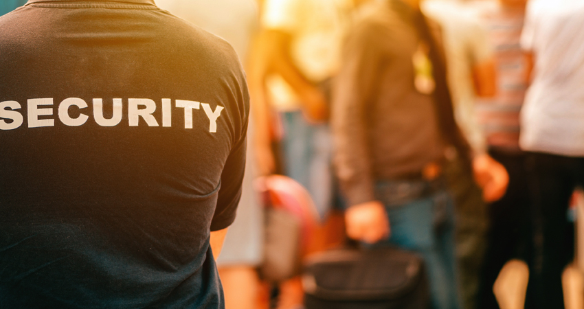 Security officer watching crowd