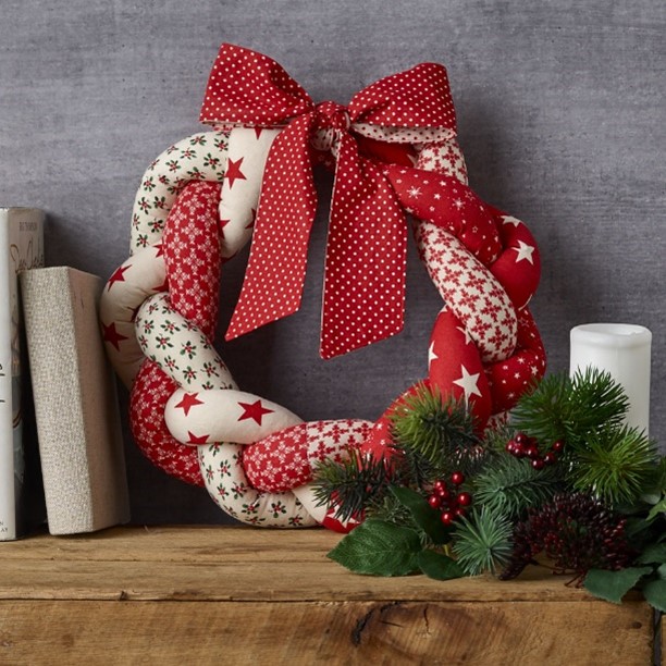 Holiday wreath on shelf