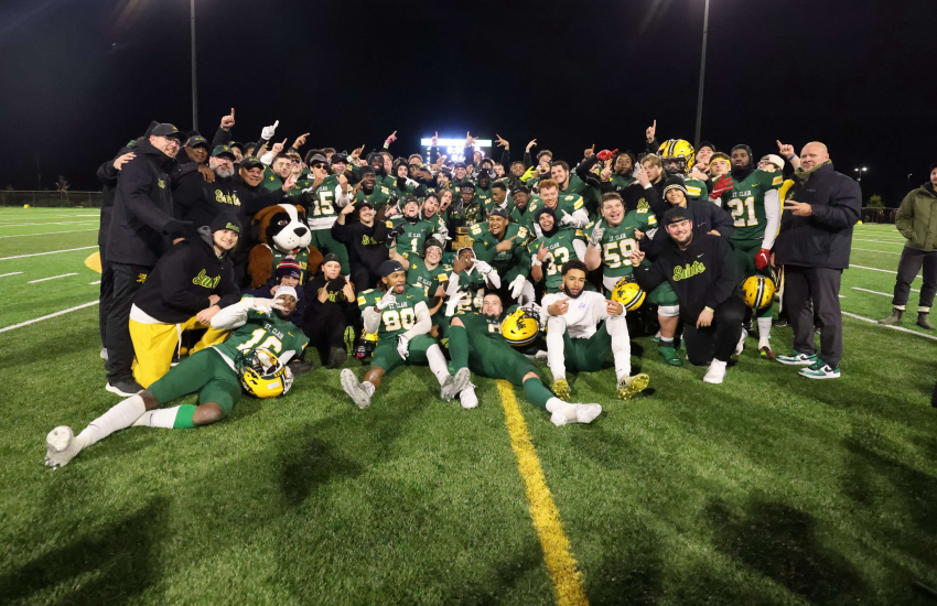 St. Clair College football team smiling for a team photo