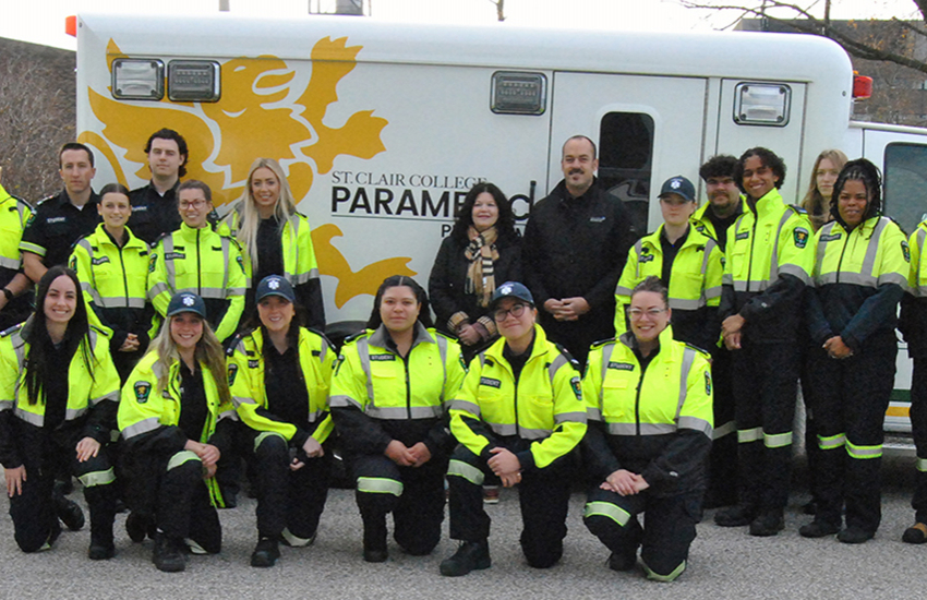 Group photo in front of St. Clair ambulance