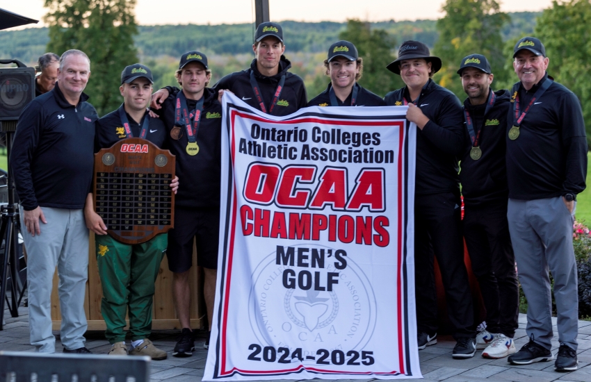 Golf team with banner