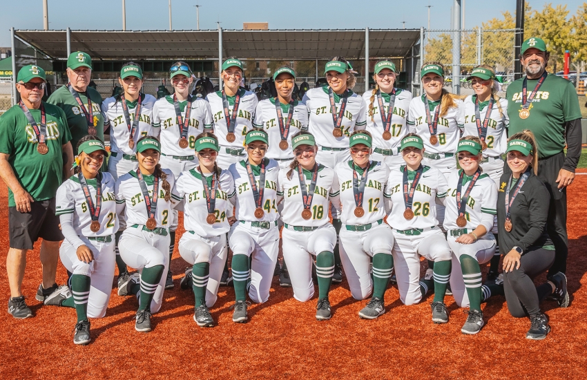 The Saints Women's Softball team poses