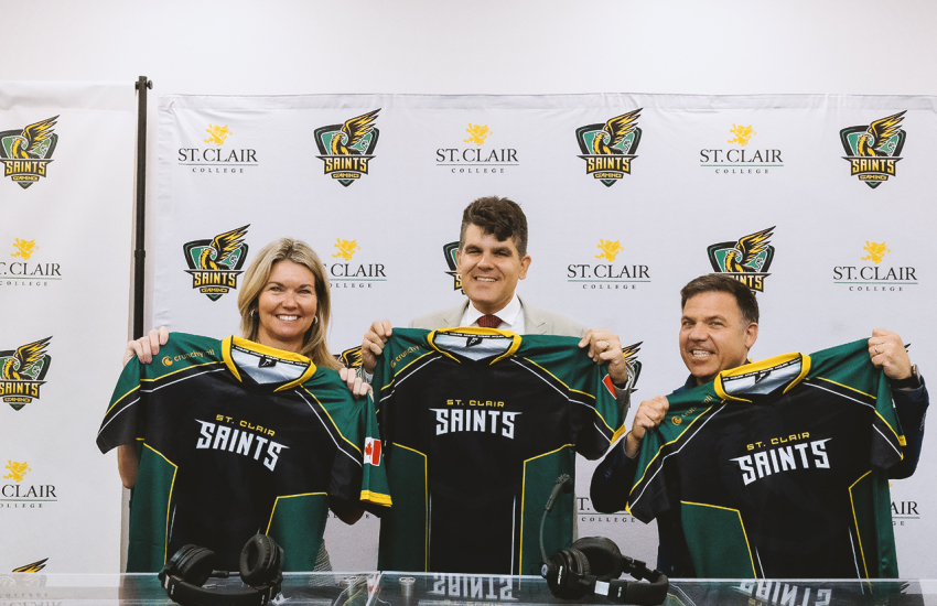 Jill Dunlop, Andrew Dowie and Anthony Leardi holding Esport jerseys