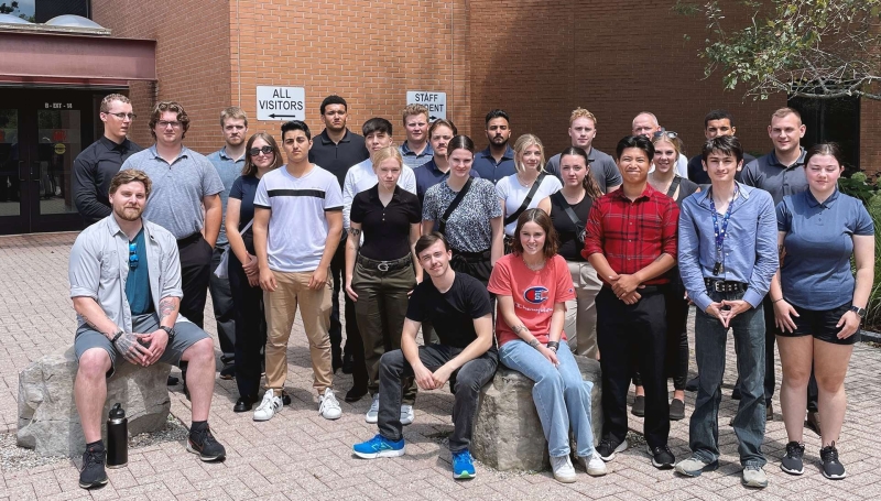 Group photo of Police Foundation Students in fron of the Ontario Police College