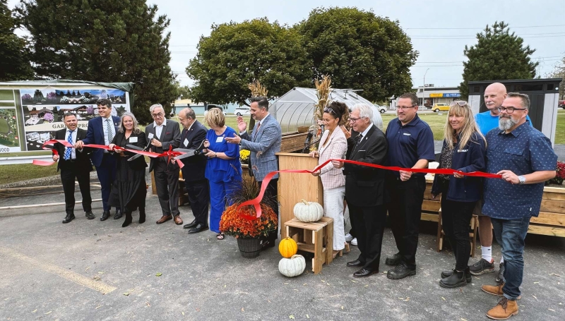 Stakeholders and community leaders gather to cut the ribbon for the Zen Garden landscape project at Brentwood Recovery Home