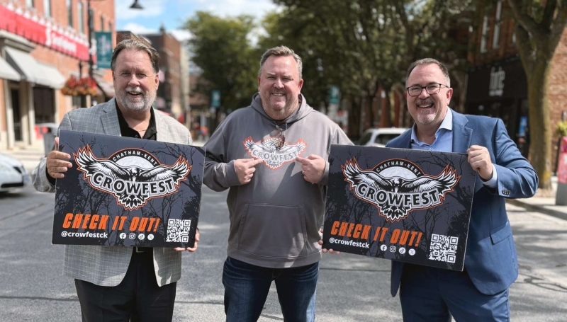 St. Clair College Senior VP John Fairley is joined by Crowfest co-chair Andrew Thiel and Chatham-Kent Mayor, Darrin Canniff