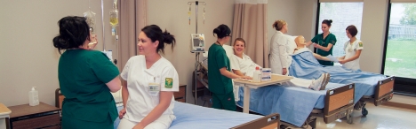 Practical nursing students doing on practical work.