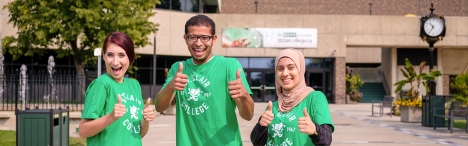 3 students with thumbs up