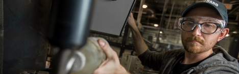 Student using CNC machine