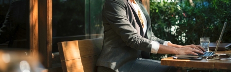 Woman typing on computer