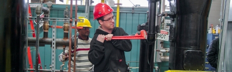 Student working on valves.